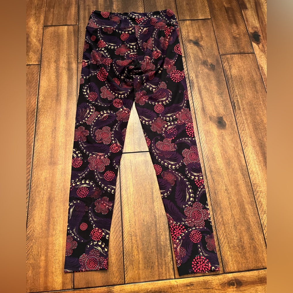 Lularoe Leggings “one size”.  Lightly used. Black, pink and purple.